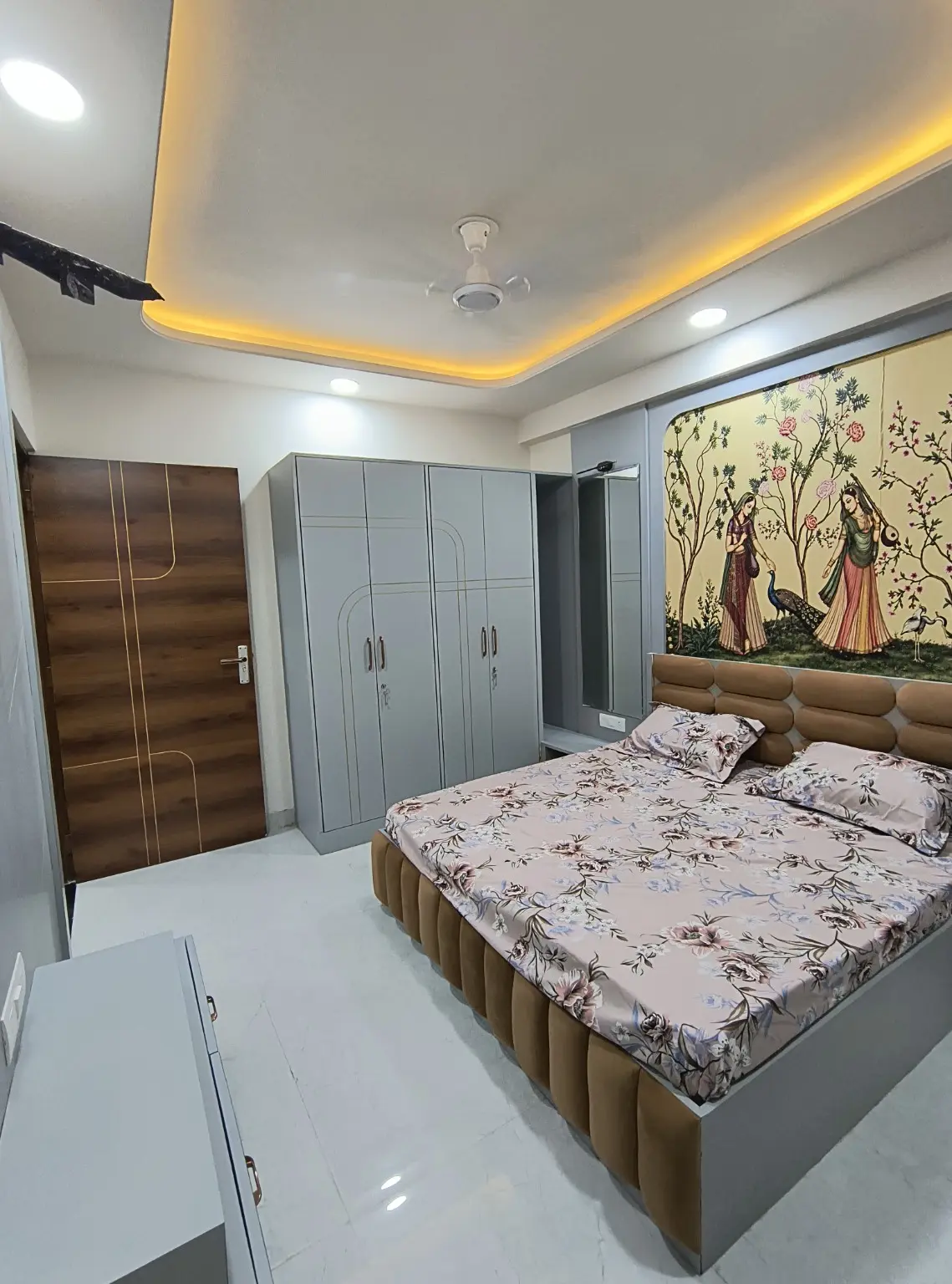 Furnished flat bedroom with fitted storage